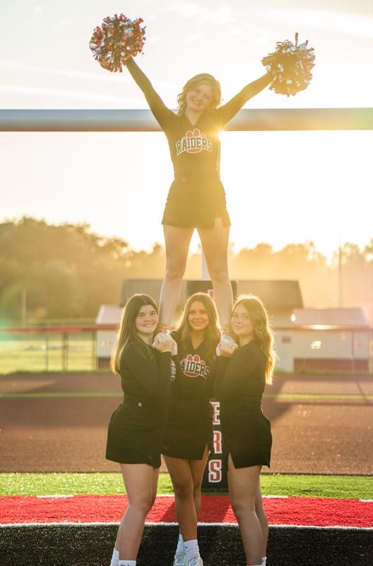 Cheerleaders doing a stunt